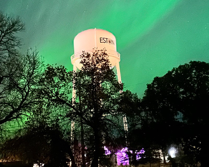 water town during northern lights